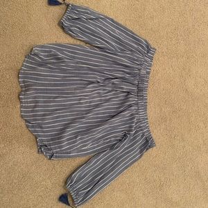 Off the should striped blue top!!